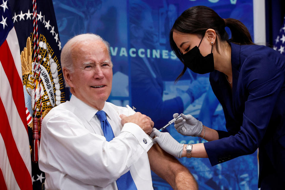 President Joe Biden receives an updated COVID-19 vaccine as he backs a new plan for Americans to receive booster shots and vaccinations in 2022. 